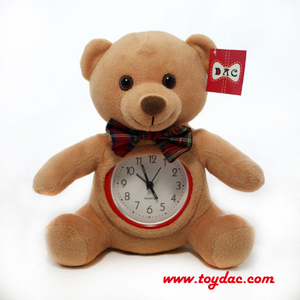 Juguete de peluche con reloj de animales.